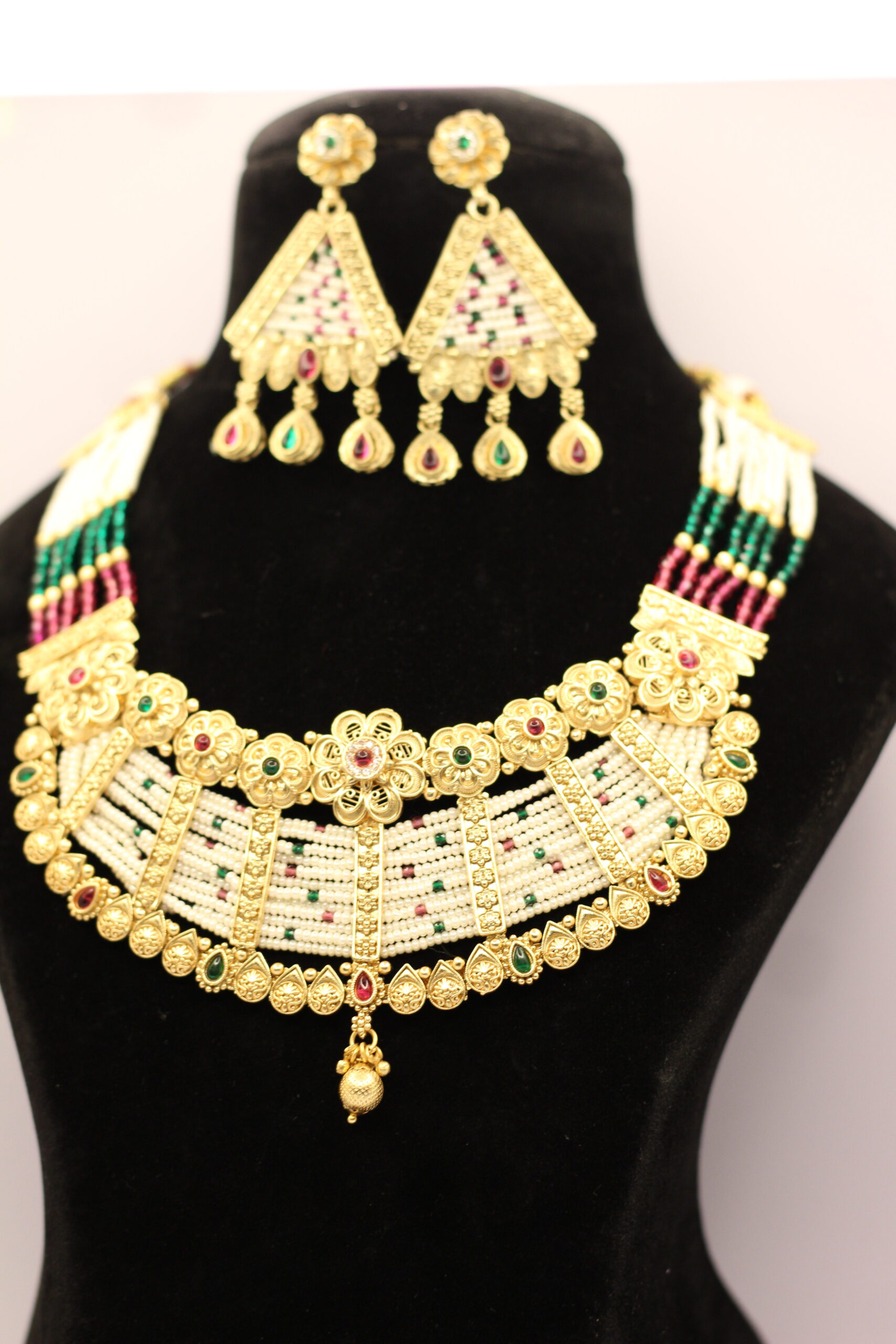 Dome-shaped traditional design with floral top