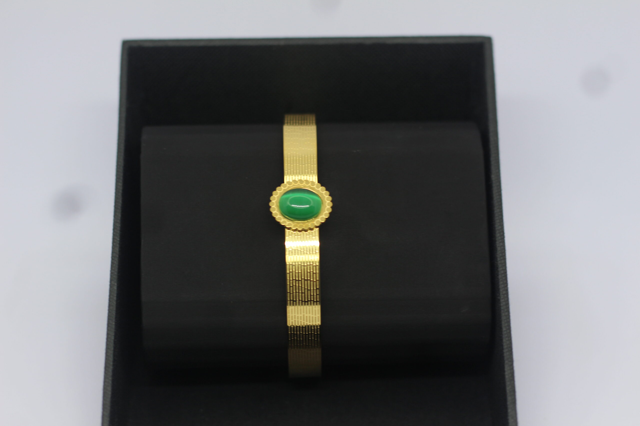 Gold-Plated Bracelet with Green Stone Centerpiece